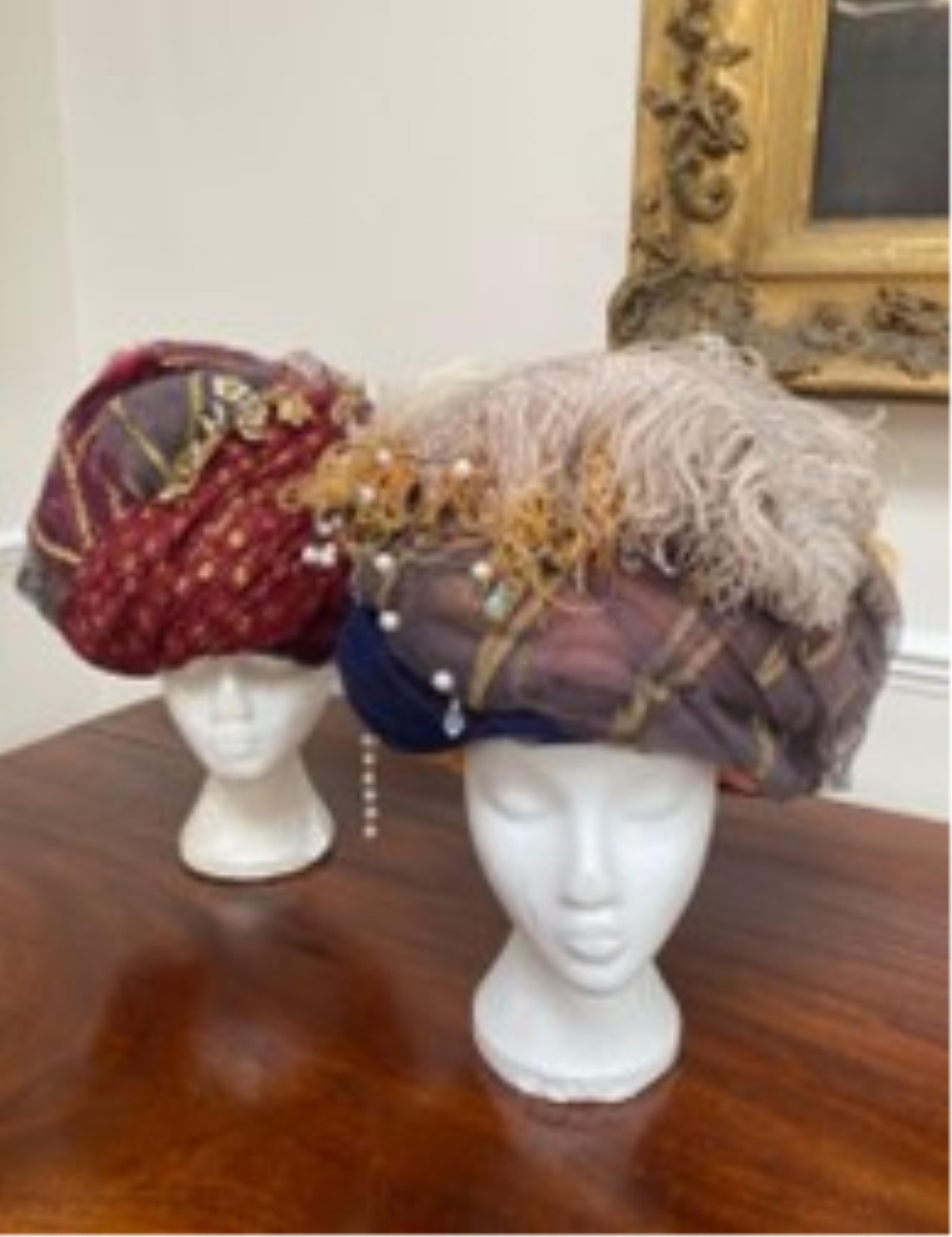 Two elaborate turbans, labelled Royal Opera House ‘Lucrezia Borgia', and two modern Indian turban hats